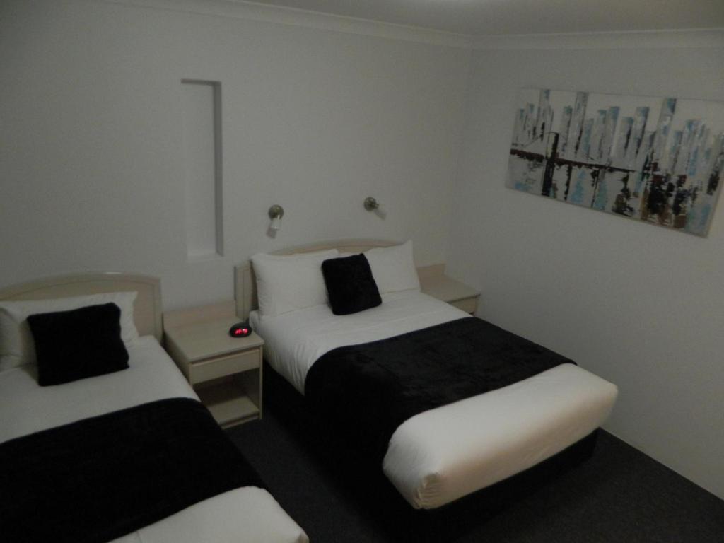 Alabaster Motor Inn Taree Quarto foto