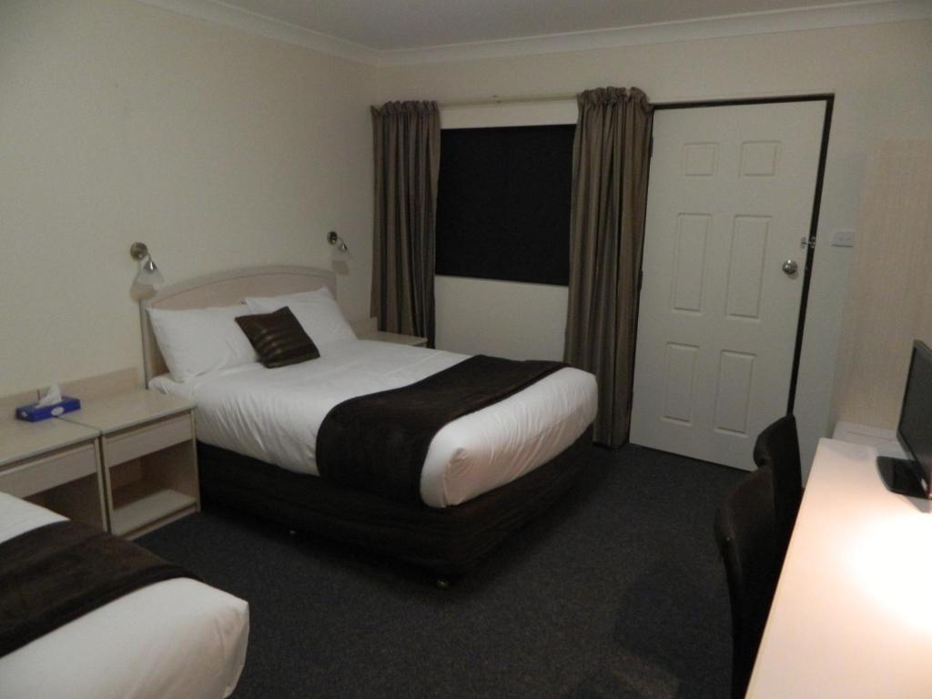 Alabaster Motor Inn Taree Quarto foto